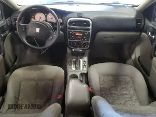 2003 Saturn LS z VIN 1G8JW54R43Y514930, wystawiony jako Copart lot #63652944 z przebiegiem 178 497 mil mil oraz Nie do naprawy. Historia ofert i sprzedaży dostępna na DreamBid. Obrazek 8.