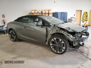2017 Buick Cascada Premium с VIN W04WH3N59HG117999, выставлен на аукционе Copart как лот 71565694 с пробегом 62 142 миль миль и Списание • Salvage title. История ставок и продаж доступна на DreamBid. Изображение 4.