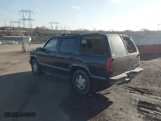 1998 Chevrolet Tahoe with VIN 1GNEK13R4WJ371916, listed as a IAAI auction lot 41689311 with 120,749 mi miles. Bid and sale history available at carsss.com. Image 3.