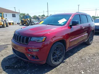 2021 Jeep Grand Cherokee Limited with VIN 1C4RJFBG2MC826922, listed as a IAAI auction lot 42651961 with 66,681 mi miles and . Bid and sale history available at DreamBid. Image 2.