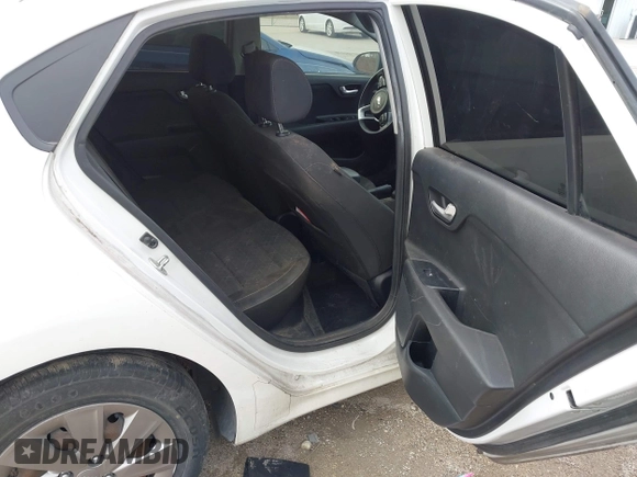 2019 Kia Rio S with VIN 3KPA24ABXKE215756, listed as a IAAI auction lot 41556461 with 122,300 mi miles. Bid and sale history available at carsss.com. Image 8.