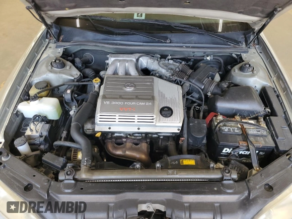 2001 Lexus ES 300 z VIN JT8BF28G910303864, wystawiony jako Copart lot #61811935 z przebiegiem 159 696 mil mil oraz Szkoda całkowita • Salvage title. Historia ofert i sprzedaży dostępna na DreamBid. Obrazek 11.