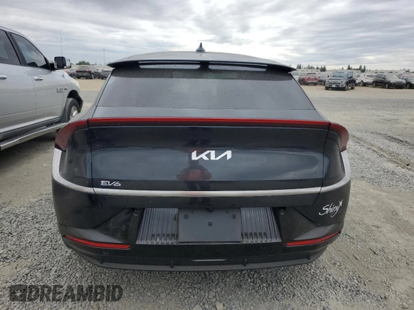 2022 Kia EV6 Wind with VIN KNDC3DLC9N5054909, listed as a Copart auction lot 76532984 with 9,180 mi miles and Salvage Title. Bid and sale history available at carsss.com. Image 6.