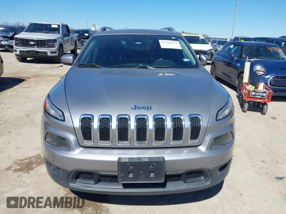 2016 Jeep Cherokee 75th Anniversary with VIN 1C4PJLCB1GW217638, listed as a IAAI auction lot 41689623 with 124,630 mi miles and . Bid and sale history available at DreamBid. Image 12.