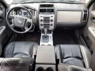 2008 Mercury Mariner Premier z VIN 4M2CU97168KJ31769, wystawiony jako Copart lot #50248325 z przebiegiem 133 450 mil mil oraz Szkody całkowita. Historia ofert i sprzedaży dostępna na DreamBid. Obrazek 8.
