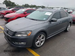 2013 Volkswagen Passat SE with VIN 1VWBN7A34DC148052, listed as a IAAI auction lot 42423919 with 83,634 mi miles and . Bid and sale history available at DreamBid. Image 2.