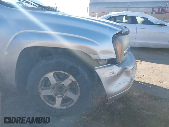 2006 Chevrolet TrailBlazer LS with VIN 1GNDS13S862265008, listed as a IAAI auction lot 41263151 with 254,504 mi miles and . Bid and sale history available at DreamBid. Image 13.