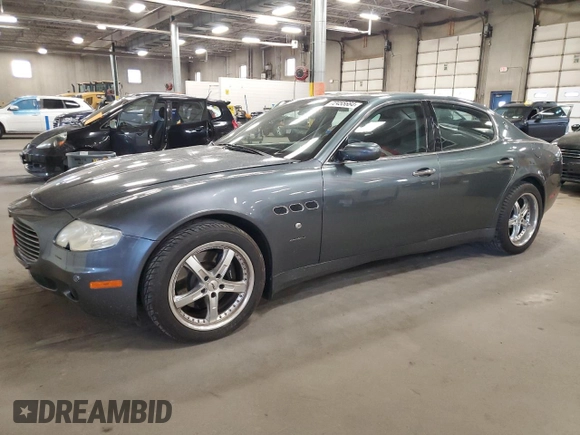 2005 Maserati Quattroporte z VIN ZAMCE39A350017390, wystawiony jako Copart lot #72455664 z przebiegiem 50 394 mil mil oraz Szkoda całkowita • Salvage title. Historia ofert i sprzedaży dostępna na DreamBid. Obrazek 1.