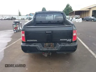 2011 Honda Ridgeline RTL with VIN 5FPYK1F53BB001385, listed as a IAAI auction lot 41945219 with 168,713 mi miles and . Bid and sale history available at DreamBid. Image 16.