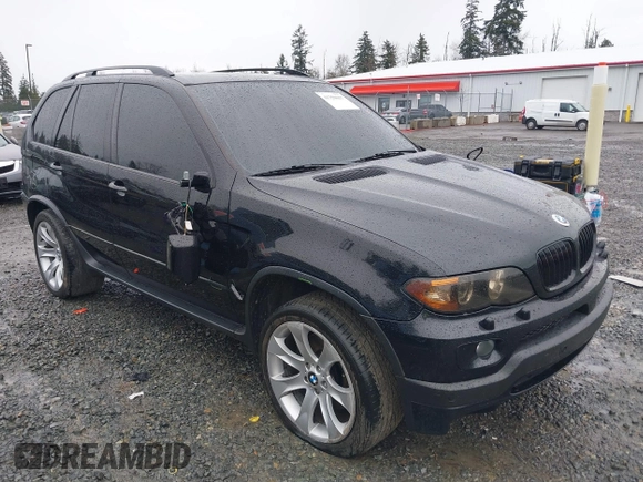 2005 BMW X5 4.8is with VIN 5UXFA93515LE82570, listed as a IAAI auction lot 41759657 with 212,687 mi miles. Bid and sale history available at carsss.com. Image 1.