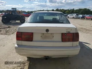 1997 Volkswagen Passat with VIN WVWGG83A0VB009323, listed as a Copart auction lot 73042334 with 261,740 mi miles and Salvage title. Bid and sale history available at DreamBid. Image 6.