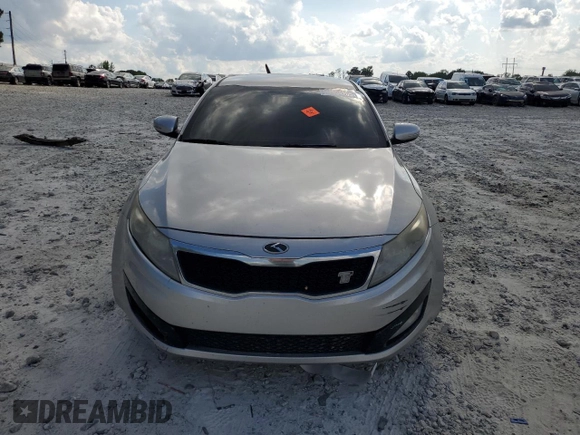 2012 Kia Optima EX z VIN 5XXGN4A75CG083916, wystawiony jako Copart lot #54954205 z przebiegiem 253 854 mil mil oraz Szkoda całkowita • Salvage title. Historia ofert i sprzedaży dostępna na DreamBid. Obrazek 5.