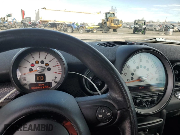 2011 MINI Hardtop S with VIN WMWSV3C55BTY24299, listed as a Copart auction lot 54725755 with 82,489 mi miles and Salvage Title. Bid and sale history available at DreamBid. Image 9.