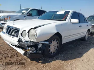 1999 Mercedes-Benz E-Class with VIN WDBJF65H6XA867166, listed as a IAAI auction lot 42017341 with 89,841 mi miles. Bid and sale history available at carsss.com. Image 2.