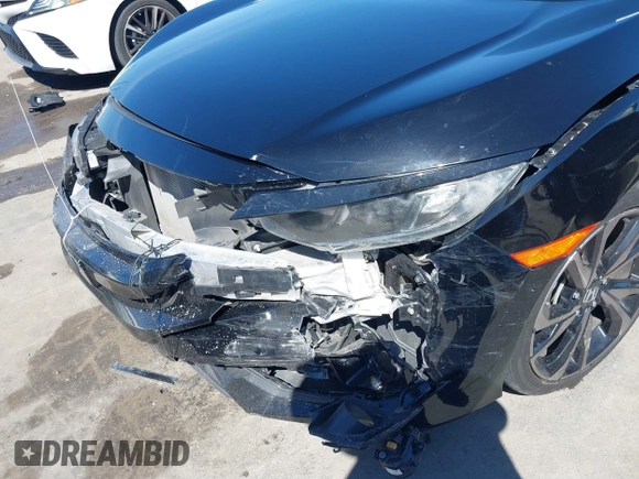 2021 Honda Civic Sport with VIN 2HGFC2F81MH529499, listed as a IAAI auction lot 41836215 with 55,833 mi miles and . Bid and sale history available at DreamBid. Image 6.