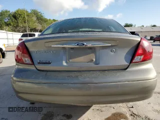 2003 Ford Taurus LX Standard with VIN 1FAFP52U13G243207, listed as a Copart auction lot 52763905 with 49,906 mi miles and Salvage title. Bid and sale history available at DreamBid. Image 6.