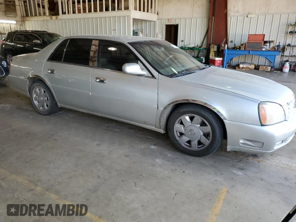 2002 Cadillac DeVille DTS with VIN 1G6KF57952U303332, listed as a Copart auction lot 61852523 with 173,500 mi miles and Clean Title. Bid and sale history available at carsss.com. Image 4.