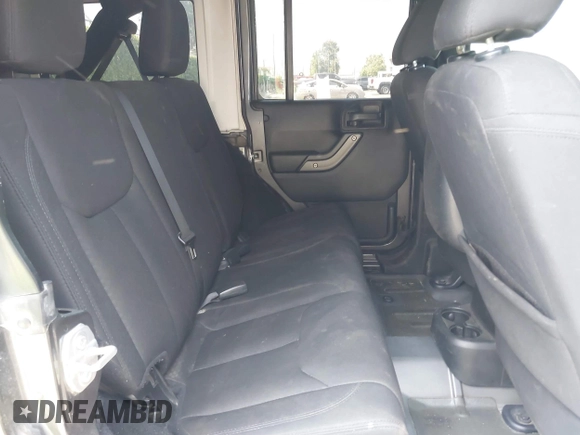 2017 Jeep Wrangler Unlimited Sport with VIN 1C4BJWDG7HL510100, listed as a IAAI auction lot 42451092 with 145,419 mi miles and . Bid and sale history available at DreamBid. Image 7.