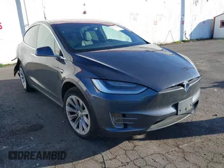 2019 Tesla Model X 75D with VIN 5YJXCAE23KF207170, listed as a IAAI auction lot 41671407 with 65,827 mi miles. Bid and sale history available at carsss.com. Image 1.