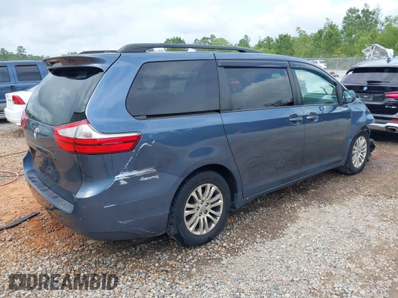 2015 Toyota Sienna XLE with VIN 5TDYK3DC1FS594123, listed as a IAAI auction lot 41944711 with 208,249 mi miles. Bid and sale history available at carsss.com. Image 4.