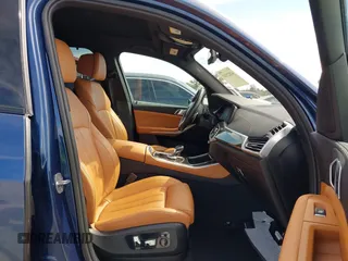 2022 BMW X5 xDrive40i with VIN 5UXCR6C05N9K88827, listed as a IAAI auction lot 41823531 with 66,021 mi miles and . Bid and sale history available at DreamBid. Image 5.