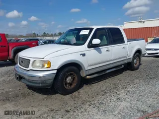 2001 Ford F-150 SuperCrew XLT with VIN 1FTRW07W91KE36030, listed as a IAAI auction lot 41718146 with 235,814 mi miles. Bid and sale history available at carsss.com. Image 2.