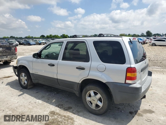 2002 Ford Escape XLT Choice with VIN 1FMYU03142KA49202, listed as a Copart auction lot 56359445 with Not provided miles and Clean title. Bid and sale history available at DreamBid. Image 2.