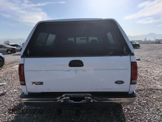 1999 Ford F-150 XL with VIN 1FTRX18L2XKA97143, listed as a Copart auction lot 52973695 with 115,180 mi miles and Salvage Title. Bid and sale history available at carsss.com. Image 6.
