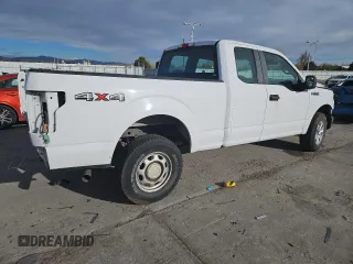 2015 Ford F-150 XLT with VIN 1FTFX1EFXFKD70393, listed as a Copart auction lot 51320365 with 173,741 mi miles and Salvage title. Bid and sale history available at DreamBid. Image 3.