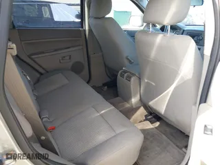 2007 Jeep Grand Cherokee Laredo with VIN 1J8GS48K77C545071, listed as a IAAI auction lot 41999998 with 144,966 mi miles. Bid and sale history available at carsss.com. Image 8.