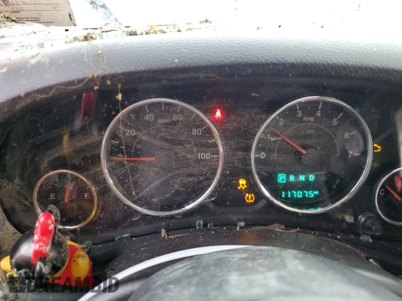 2017 Jeep Wrangler Willys Wheeler with VIN 1C4AJWAG7HL589574, listed as a Copart auction lot 79006504 with 117,075 mi miles and Salvage Title. Bid and sale history available at DreamBid. Image 9.