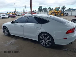2014 Audi A7 3.0 Prestige with VIN WAU2GAFC7EN059419, listed as a IAAI auction lot 41702771 with 134,474 mi miles. Bid and sale history available at carsss.com. Image 14.