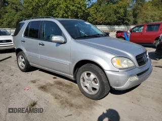 2002 Mercedes-Benz M-Class with VIN 4JGAB54E52A337189, listed as a Copart auction lot 71348154 with 220,378 mi miles and Salvage Title. Bid and sale history available at carsss.com. Image 4.