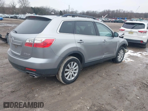 2010 Mazda CX-9 Sport with VIN JM3TB2MV4A0215219, listed as a IAAI auction lot 41556257 with 247,813 mi miles. Bid and sale history available at carsss.com. Image 4.