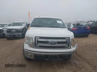 2014 Ford F-150 XL with VIN 1FTFX1EF3EKE72732, listed as a IAAI auction lot 41277885 with 153,712 mi miles. Bid and sale history available at carsss.com. Image 12.