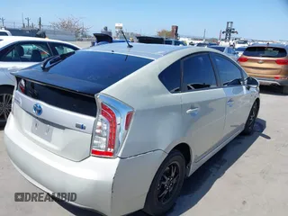 2015 Toyota Prius Four with VIN JTDKN3DU1F1986165, listed as a IAAI auction lot 42281036 with 212,838 mi miles and . Bid and sale history available at DreamBid. Image 4.