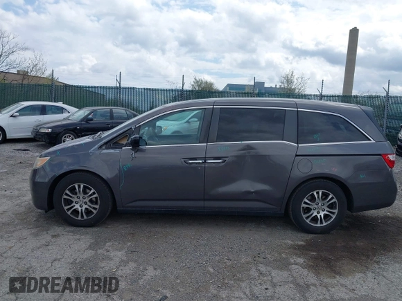 2013 Honda Odyssey EX-L with VIN 5FNRL5H63DB034963, listed as a IAAI auction lot 41921431 with 163,609 mi miles and . Bid and sale history available at DreamBid. Image 6.