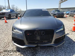 2015 Audi RS 7 Prestige z VIN WUAW2AFC8FN900610, wystawiony jako Copart lot #50708225 z przebiegiem 103 811 mil mil oraz Szkody całkowita. Historia ofert i sprzedaży dostępna na DreamBid. Obrazek 5.