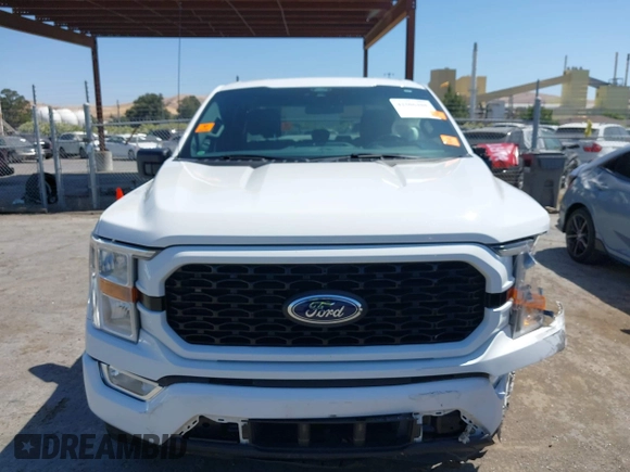 2021 Ford F-150 XL z VIN 1FTEX1CP7MFA52910, wystawiony jako IAAI lot #42506488 z przebiegiem 99 607 mil mil oraz . Historia ofert i sprzedaży dostępna na DreamBid. Obrazek 13.