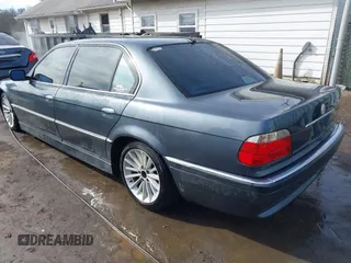 2001 BMW 7 Series 740iL with VIN WBAGH83491DP28749, listed as a IAAI auction lot 41440556 with 198,734 mi miles. Bid and sale history available at carsss.com. Image 3.