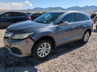 2017 Acura RDX Technology with VIN 5J8TB4H57HL011765, listed as a Copart auction lot 59239315 with 136,718 mi miles and Salvage title. Bid and sale history available at DreamBid. Image 1.