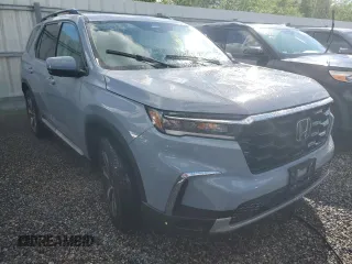 2025 Honda Pilot Elite with VIN 5FNYG1H88SB004011, listed as a Copart auction lot 73641254 with 0 mi miles and Salvage Title. Bid and sale history available at carsss.com. Image 4.