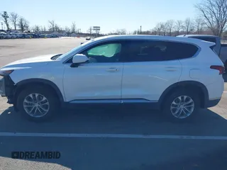 2019 Hyundai Santa Fe SEL z VIN 5NMS3CADXKH071437, wystawiony jako IAAI lot #41752902 z przebiegiem 66 980 mil mil oraz . Historia ofert i sprzedaży dostępna na DreamBid. Obrazek 14.