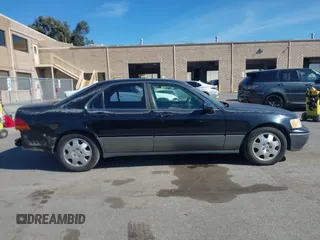 1998 Acura RL Special Edition with VIN JH4KA9686WC009959, listed as a IAAI auction lot 41632413 with 130,788 mi miles. Bid and sale history available at carsss.com. Image 14.