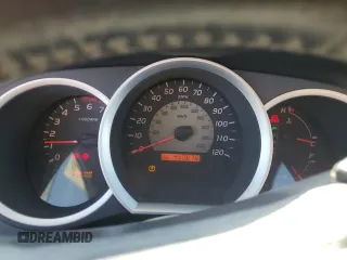 2010 Toyota Tacoma PreRunner with VIN 3TMKU4HN4AM025390, listed as a Copart auction lot 50242825 with 450,676 mi miles and Salvage title. Bid and sale history available at DreamBid. Image 9.