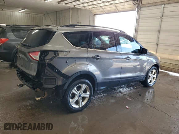 2014 Ford Escape SE with VIN 1FMCU0G99EUC31447, listed as a Copart auction lot 52894605 with 172,995 mi miles and Salvage Title. Bid and sale history available at carsss.com. Image 3.