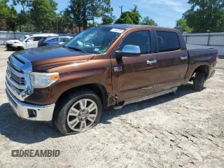2014 Toyota Tundra Platinum with VIN 5TFAY5F14EX368030, listed as a Copart auction lot 61136735 with 163,627 mi miles and Salvage title. Bid and sale history available at DreamBid. Image 1.