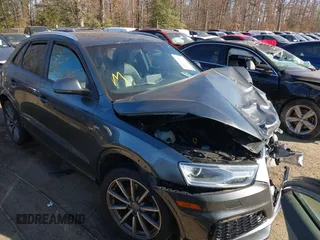2018 Audi Q3 Premium with VIN WA1ECCFS9JR022013, listed as a IAAI auction lot 40960982 with 50,663 mi miles. Bid and sale history available at carsss.com. Image 1.