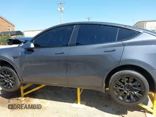 2022 Tesla Model Y Long Range with VIN 7SAYGDEE0NF387512, listed as a IAAI auction lot 41850901 with Not Provided miles and . Bid and sale history available at carsss.com. Image 14.