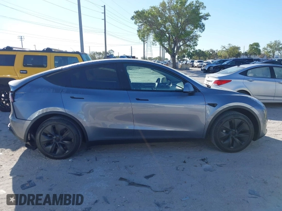 2025 Tesla Model Y Long Range with VIN 7SAYGDED7SA376233, listed as a IAAI auction lot 41777876 with 70 mi miles and . Bid and sale history available at DreamBid. Image 13.